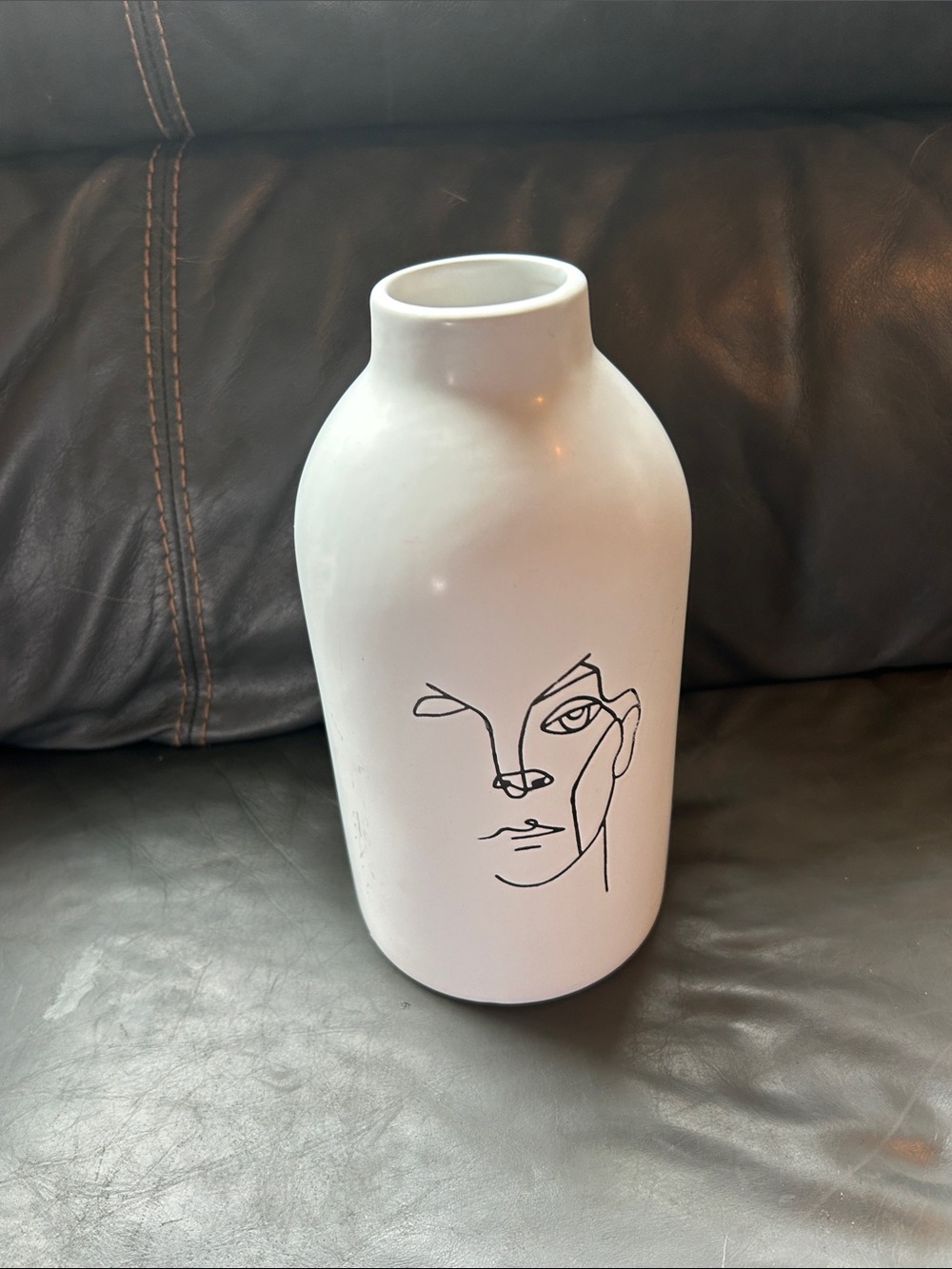 Minimalist White Ceramic Vase with Line Art Face